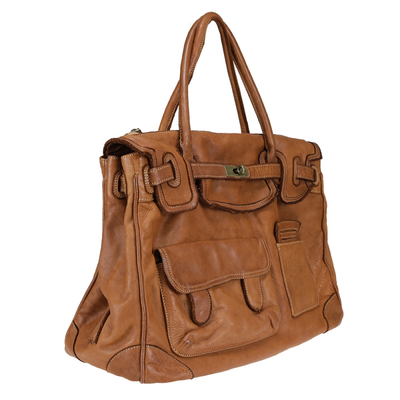 Vintage effect handbag in smooth leather with pockets