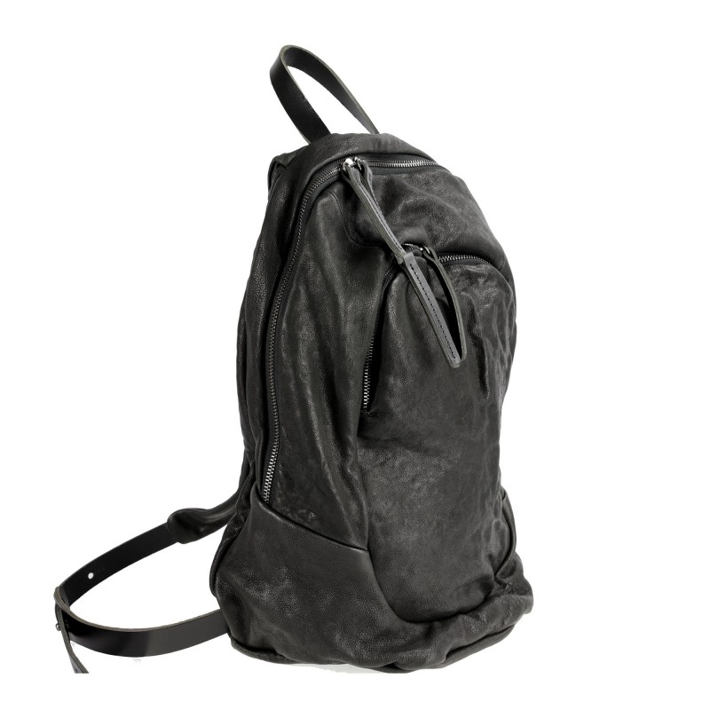 Leather backpack with vegetable treatment