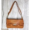 Leather cross-body bag with front buckle decoration