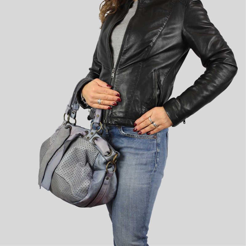Hand-buffered leather bag with laser processing
