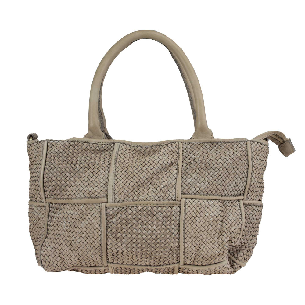 Handmade shopping bag in woven leather